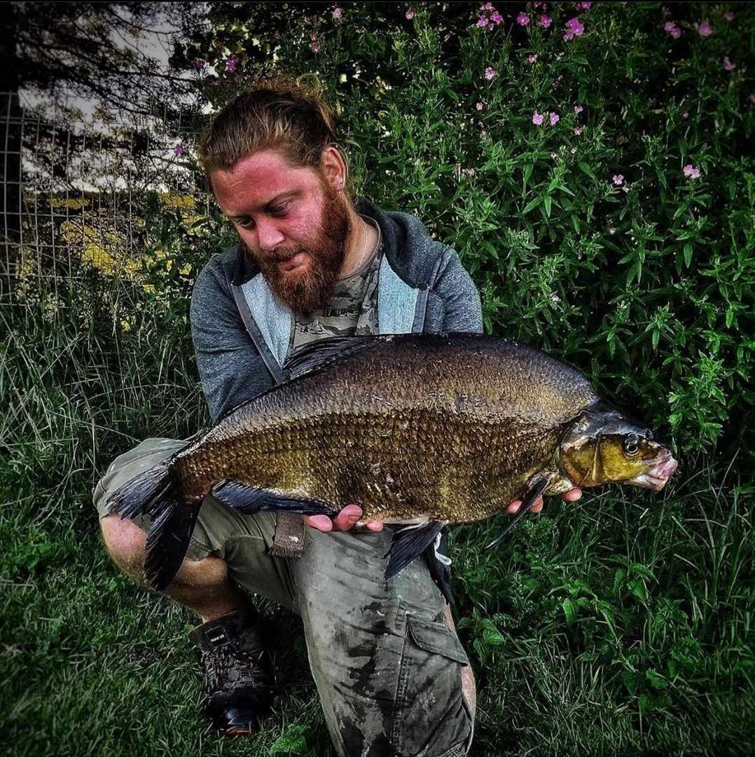 Matt Peplow holding an 11lb 11oz Common Bream Fishing catch